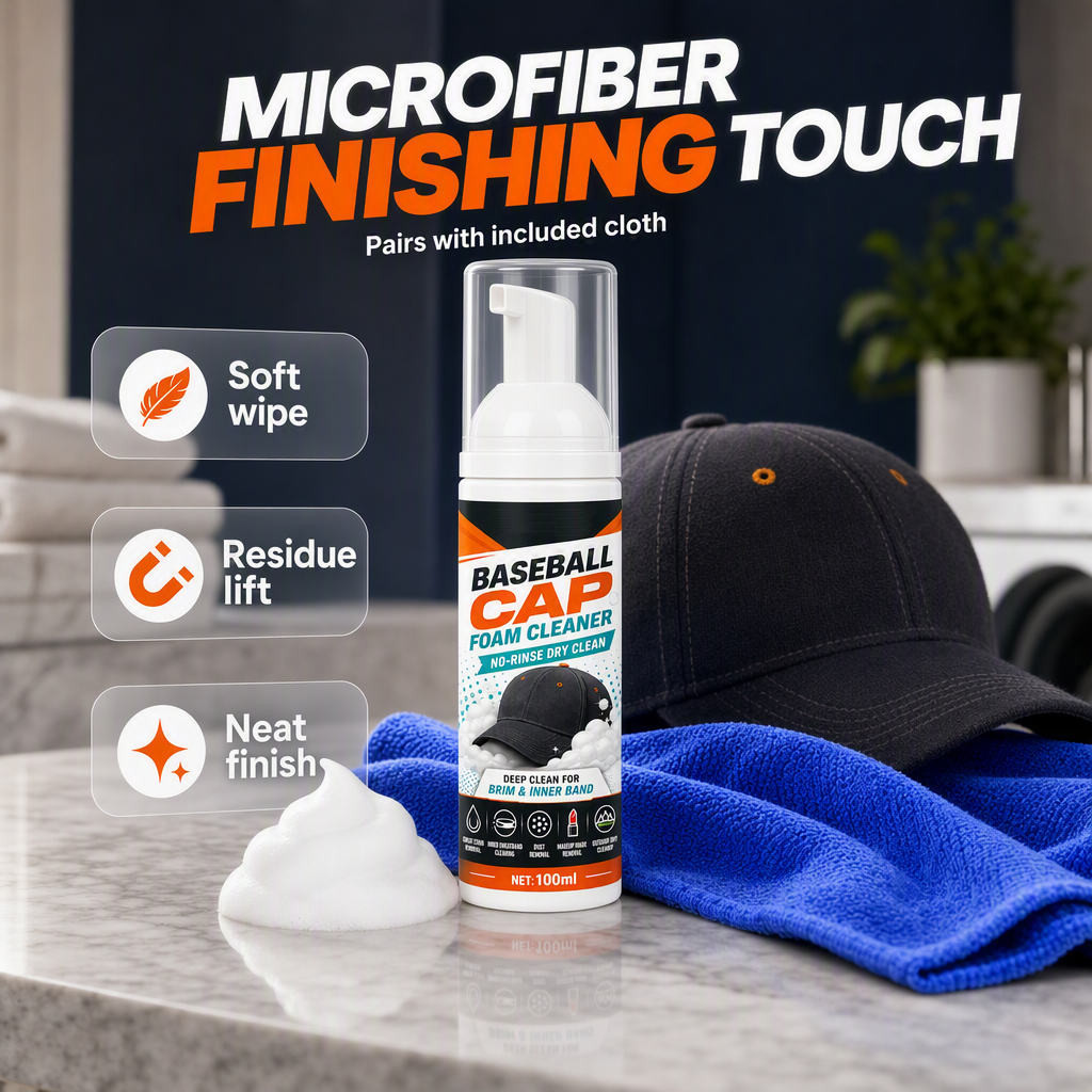 Foam cleaner bottle, black baseball cap and blue microfiber cloth.